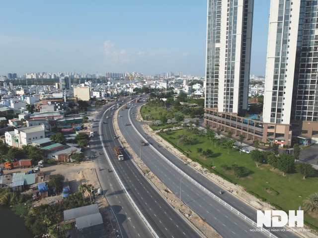 TP HCM: Dự án mở rộng đại lộ Nguyễn Văn Linh lên 10 làn xe sắp hoàn thành - Ảnh 12.