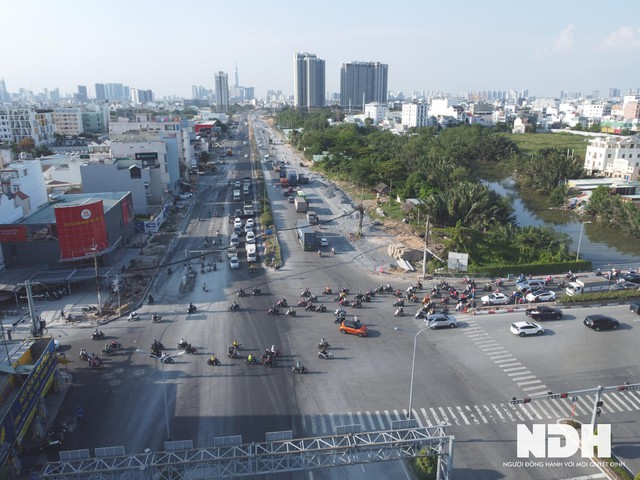 TP HCM: Dự án mở rộng đại lộ Nguyễn Văn Linh lên 10 làn xe sắp hoàn thành - Ảnh 6.