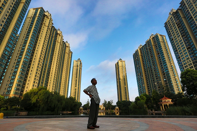 Trung Quốc ‘siết’ ngành bất động sản, tài sản giới tỷ phú địa ốc bốc hơi 65 tỷ USD, có người mất tới 90% - Ảnh 2.