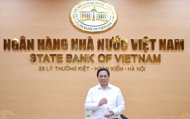 Thủ tướng Phạm Minh Chính bày tỏ mong muốn các ngân hàng thương mại cùng chia sẻ với Đảng, Nhà nước, nhân dân, tạo ra nguồn lực, sức mạnh phát triển mới - Ảnh: VGP/Nhật Bắc