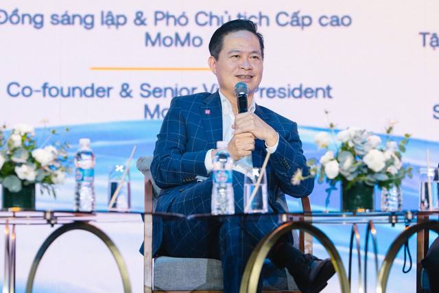 MoMo học Elon Musk để chữa cơn bội thực AI - Ảnh 1.