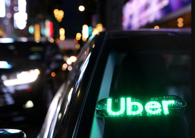 Vừa kinh doanh khách sạn, vừa đặt cược 10 tỷ USD vào Robotaxi: Uber đang âm mưu điều gì? - Ảnh 1.