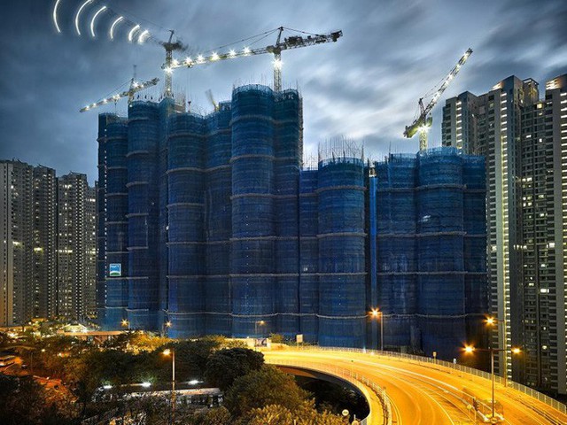 [Ảnh] Ấn tượng với cách người Hồng Kông xây dựng những tòa nhà chọc trời chỉ với giàn giáo bằng tre - Ảnh 10.