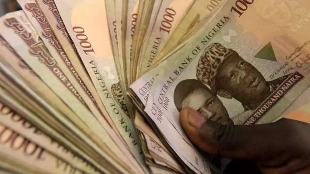 Vì sao Nigeria thất bại đi lên thị trường phi tiền mặt? - Ảnh 3.