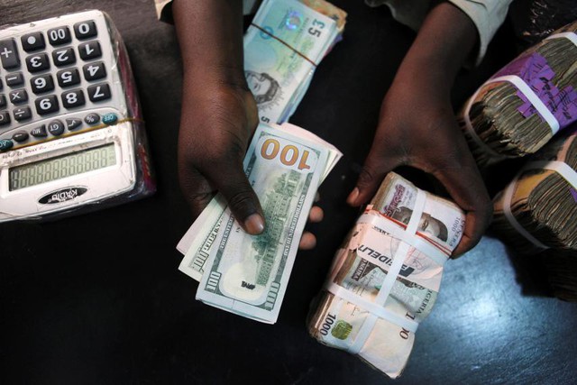Vì sao Nigeria thất bại đi lên thị trường phi tiền mặt? - Ảnh 2.