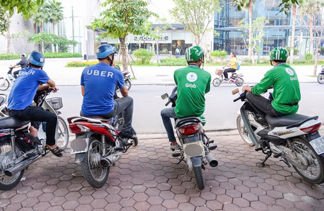 Từ ngày 8/4, toàn bộ tài xế Uber tại Việt Nam sẽ chuyển sang Grab hoạt động - Ảnh 1.