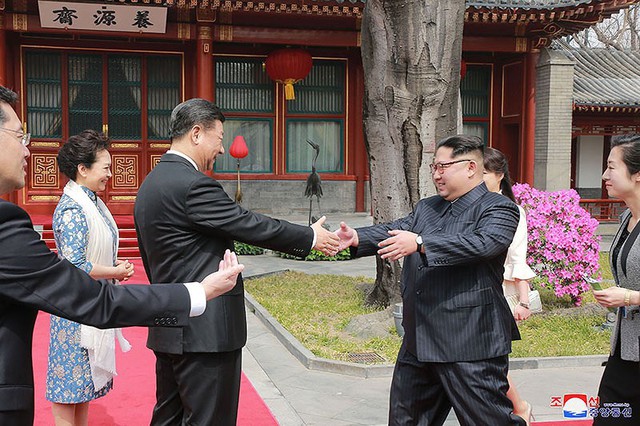Toàn cảnh chuyến công du Trung Quốc ấn tượng của ông Kim Jong-un - Ảnh 21.