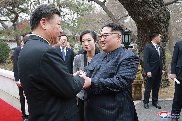 Toàn cảnh chuyến công du Trung Quốc ấn tượng của ông Kim Jong-un - Ảnh 25.