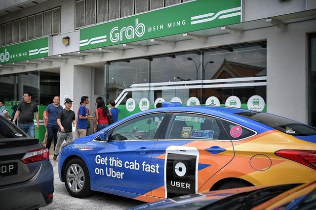 Khó hoàn tất thương vụ Uber – Grab ở Đông Nam Á - Ảnh 1. Khó hoàn tất thương vụ Uber – Grab ở Đông Nam Á - Ảnh 1.