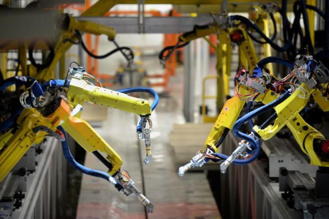Đây mới là cách mạng 4.0: Tại nhà máy 30.000 robot cùng hoạt động, cứ 50 giây lắp xong 1 xe ô tô - Ảnh 4.