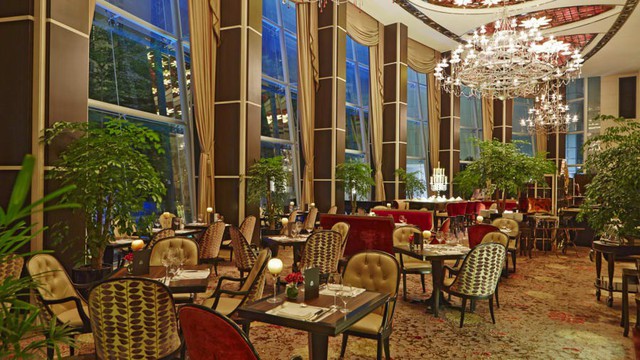 Khách sạn hạng sang St. Regis - Nơi nghỉ lại của Kim Jong-un ở Singapore - Ảnh 6.