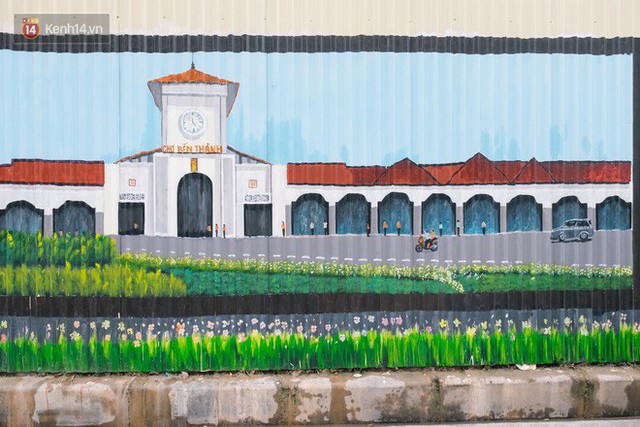 Chùm ảnh: Bức tường tôn cũ kỹ dài 300 mét ở Hà Nội bỗng hóa thành con đường bích họa đong đầy nhiều câu chuyện - Ảnh 11.