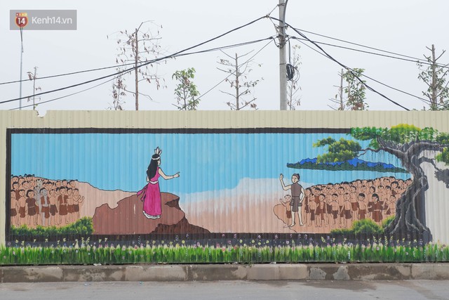Chùm ảnh: Bức tường tôn cũ kỹ dài 300 mét ở Hà Nội bỗng hóa thành con đường bích họa đong đầy nhiều câu chuyện - Ảnh 12.