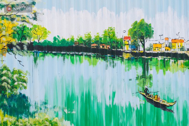 Chùm ảnh: Bức tường tôn cũ kỹ dài 300 mét ở Hà Nội bỗng hóa thành con đường bích họa đong đầy nhiều câu chuyện - Ảnh 9. Chùm ảnh: Bức tường tôn cũ kỹ dài 300 mét ở Hà Nội bỗng hóa thành con đường bích họa đong đầy nhiều câu chuyện - Ảnh 9.