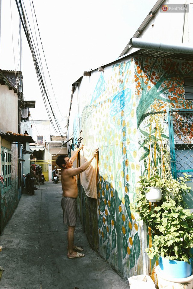 Ông giáo về hưu mang đến những bức tranh mùa xuân mới trong con hẻm nhỏ bình dị ở Sài Gòn - Ảnh 11. Ông giáo về hưu mang đến những bức tranh mùa xuân mới trong con hẻm nhỏ bình dị ở Sài Gòn - Ảnh 11.