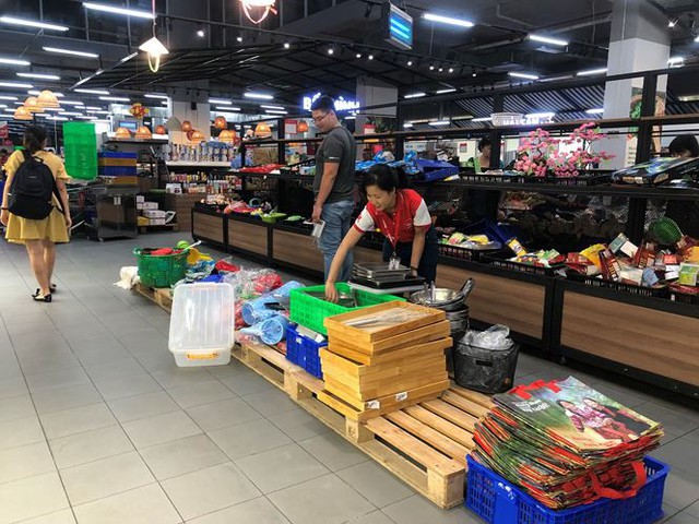 Hình ảnh siêu thị Auchan sau nhiều ngày tháo khoán rút khỏi Việt Nam - Ảnh 11.