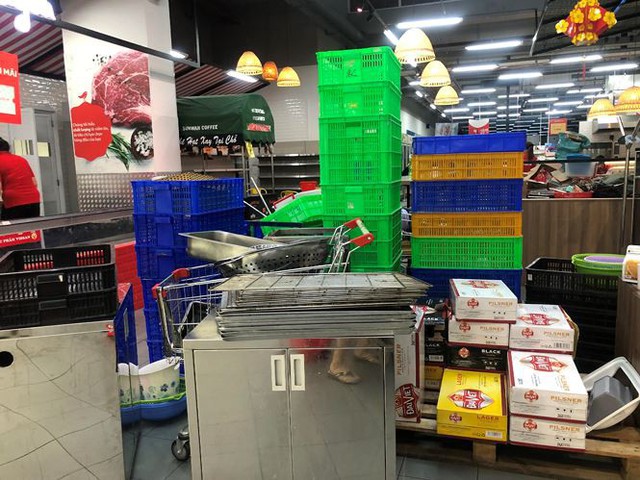 Hình ảnh siêu thị Auchan sau nhiều ngày tháo khoán rút khỏi Việt Nam - Ảnh 12.