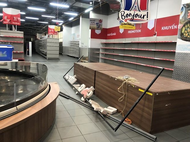 Hình ảnh siêu thị Auchan sau nhiều ngày tháo khoán rút khỏi Việt Nam - Ảnh 14.