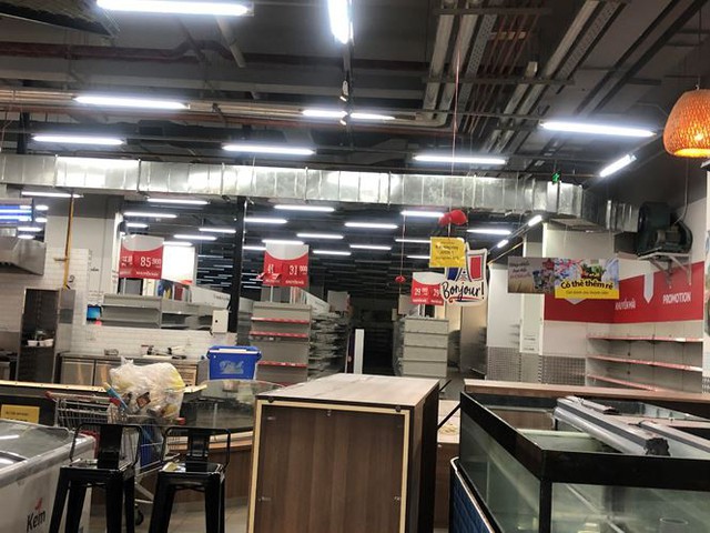 Hình ảnh siêu thị Auchan sau nhiều ngày tháo khoán rút khỏi Việt Nam - Ảnh 9.