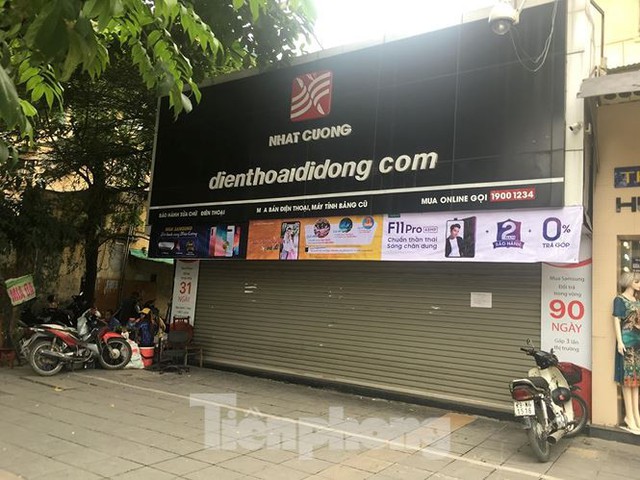 Bộ Công an khám xét chuỗi cửa hàng Nhật Cường mobile - Ảnh 6. Bộ Công an khám xét chuỗi cửa hàng Nhật Cường mobile - Ảnh 6.