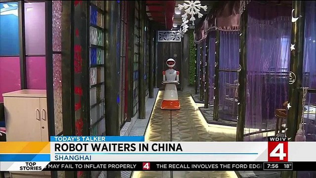 Khi giới trẻ Trung Quốc không muốn làm phục vụ bàn, các cửa hàng đành nhờ cậy vào robot - Ảnh 3.
