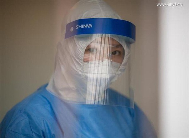  Thế giới trong vòng xoáy virus corona: Những bức hình ám ảnh  - Ảnh 10.