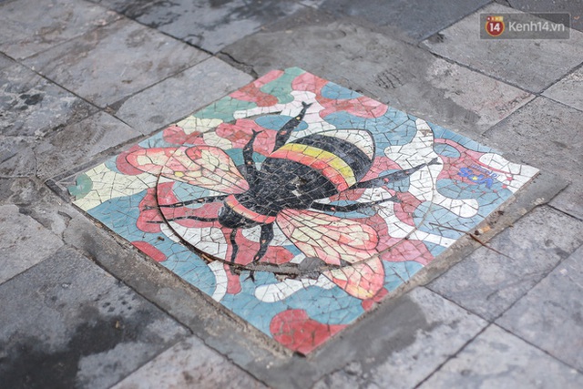 Ảnh: Nắp cống, hố ga “vô tri, vô giác” tại phố đi bộ Hà Nội biến thành tác phẩm nghệ thuật đẹp như tranh vẽ - Ảnh 8.