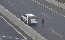 Phạt 7 triệu đồng, tước giấy phép lái xe 3 tháng nữ tài xế đỗ xe chụp ảnh trên cao tốc
