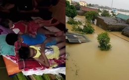 Quảng Bình: Nước lũ dâng cao, nhấn chìm nhà cửa, người dân kêu cứu giữa biển nước mênh mông