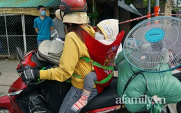 Giữa dòng người rời Sài Gòn tránh dịch, mẹ địu con chạy xe máy 400km về với Tây Nguyên