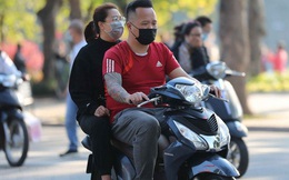 Từ 2022, người đi xe máy không đội mũ bảo hiểm có thể bị phạt tới 600.000 đồng