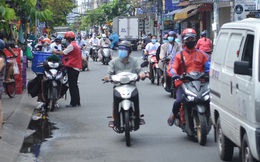 TP.HCM: Dân thong dong tập thể dục, đi chợ, quán ăn nhộn nhịp sau thông tin quận 7 thí điểm mở cửa trở lại