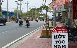 Xử lý dứt điểm việc biển quảng cáo cửa hàng ‘nhái' cột mốc giao thông ở TPHCM