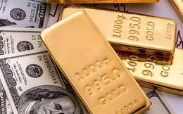 Giá vàng ‘hạ nhiệt’, USD đi ngang