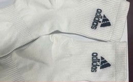 Khởi tố chủ cơ sở sản xuất 200.000 đôi tất giả nhãn hiệu Nike, Adidas, Uniqlo