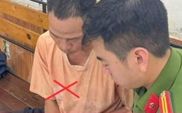 Tạm giữ hình sự ông bố buộc xích, kéo lê con trai trên phố ở Hải Phòng