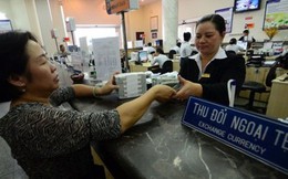 “Cân đong” bài toán tỷ giá và lãi suất