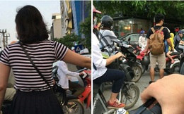 Hành động của đôi bạn trẻ khiến người đi đường Hà Nội "đứng hình"