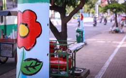 Người dân thích thú khi hơn 100 cột điện, cột đèn ở Sài Gòn bỗng "nở hoa"
