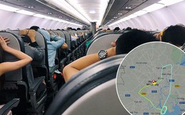 Clip: Hành khách đồng loạt vào "tư thế an toàn" trên chuyến bay Vietjet nghi gặp sự cố phải bay vòng trên trời rồi quay lại Tân Sơn Nhất