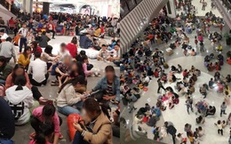 Hình ảnh người dân ngồi la liệt để ăn uống ở TTTM trong ngày nghỉ Tết Dương lịch gây xôn xao