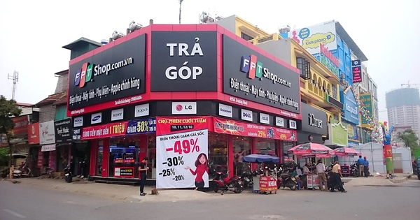 FPT Shop bắt tay Vietcombank biến hơn 600 cửa hàng trở thành "cây ATM" rút, chuyển tiền